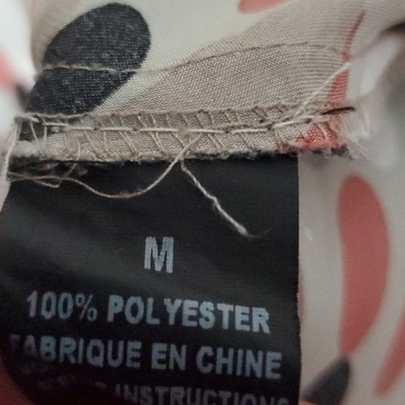 Larry Levine Ruffled Flutter Sleeveless Blouse with oval circle pattern - Picture 8 of 10